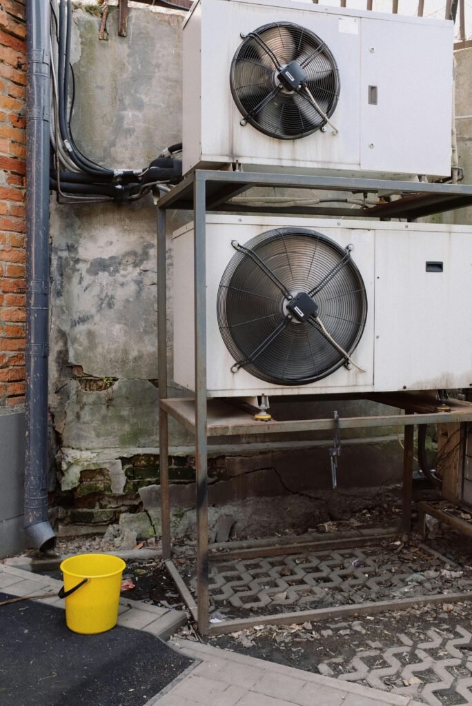 External units of air condition system installed on metal frame outside of building